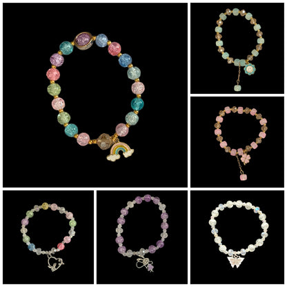 Assorted Beaded Stretch Bracelets with Dangle Butterfly, Rainbow, Flower, Rabbit, Heart or Clover Charms. Great for the Cruising Ducks Game!
